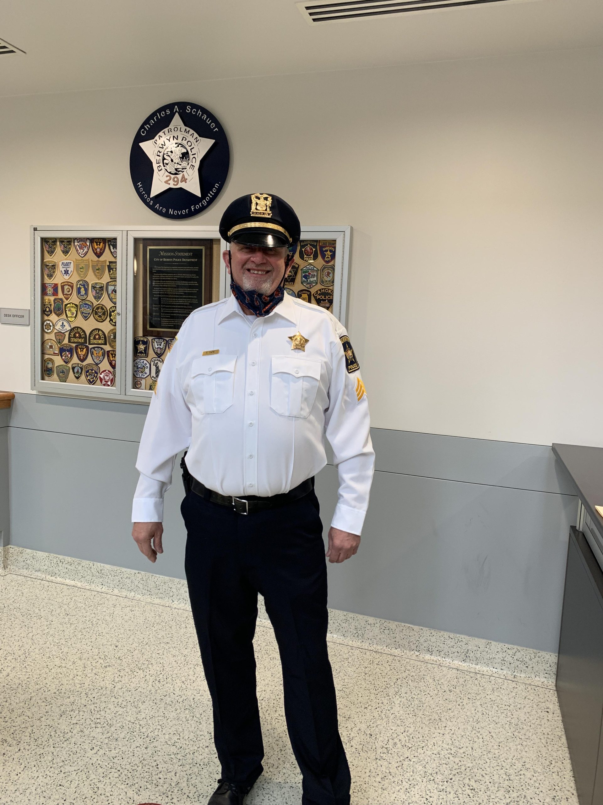 Retired police sergeant proudly representing serving heroes in real estate, wearing full uniform